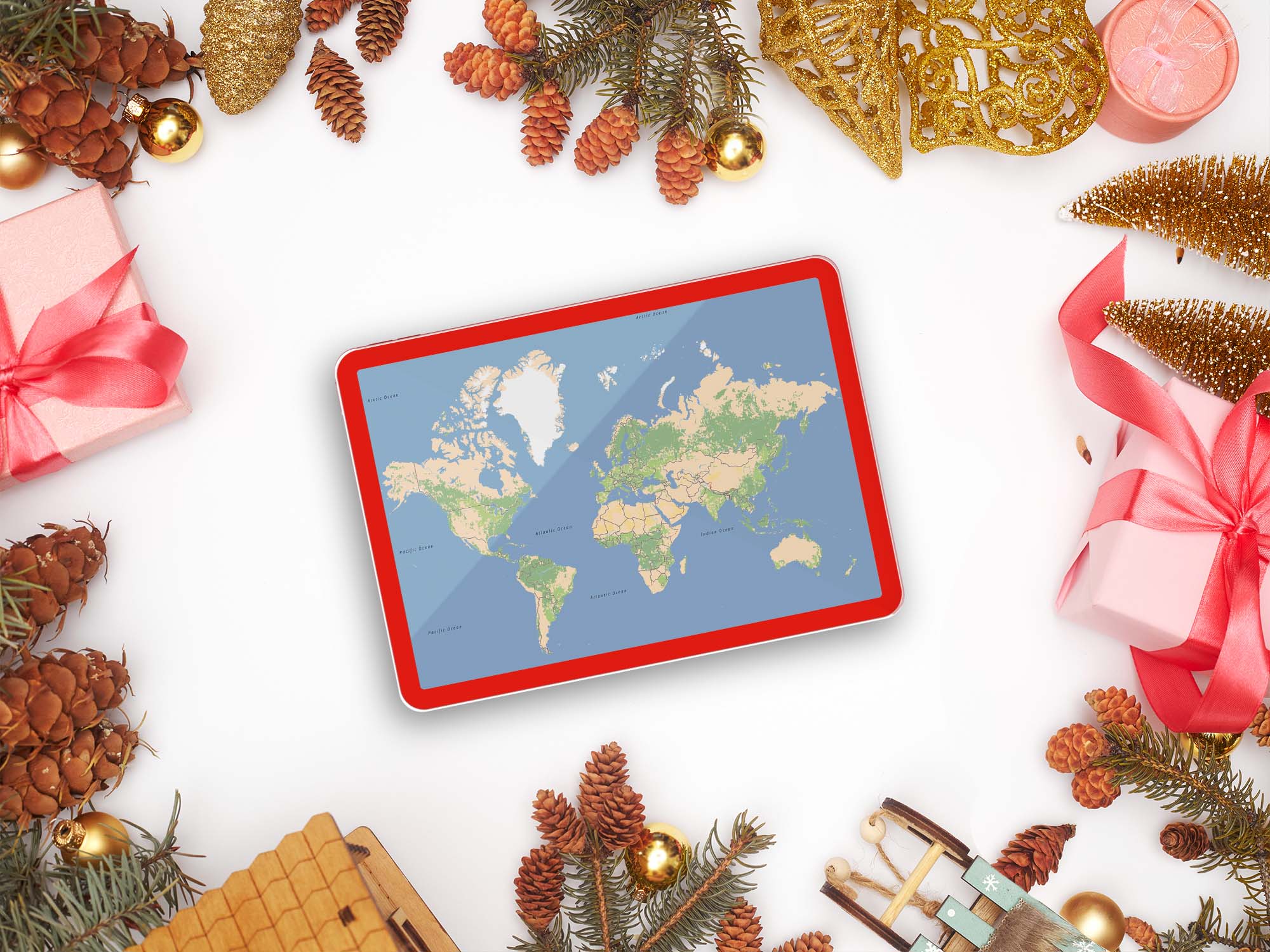 A tablet showing TomTom maps with a border of holiday items