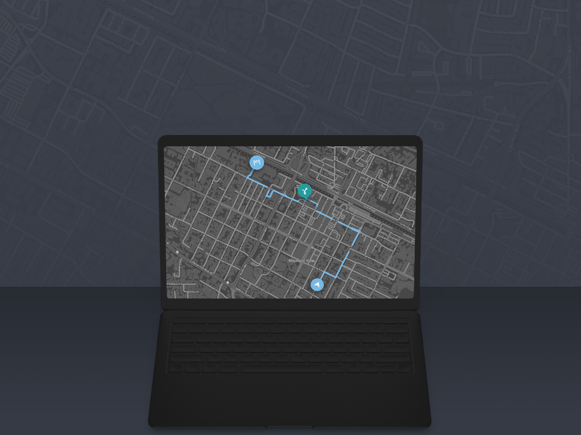 Laptop displaying map with code